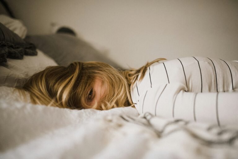 signs of burnout in women – woman in grey zone